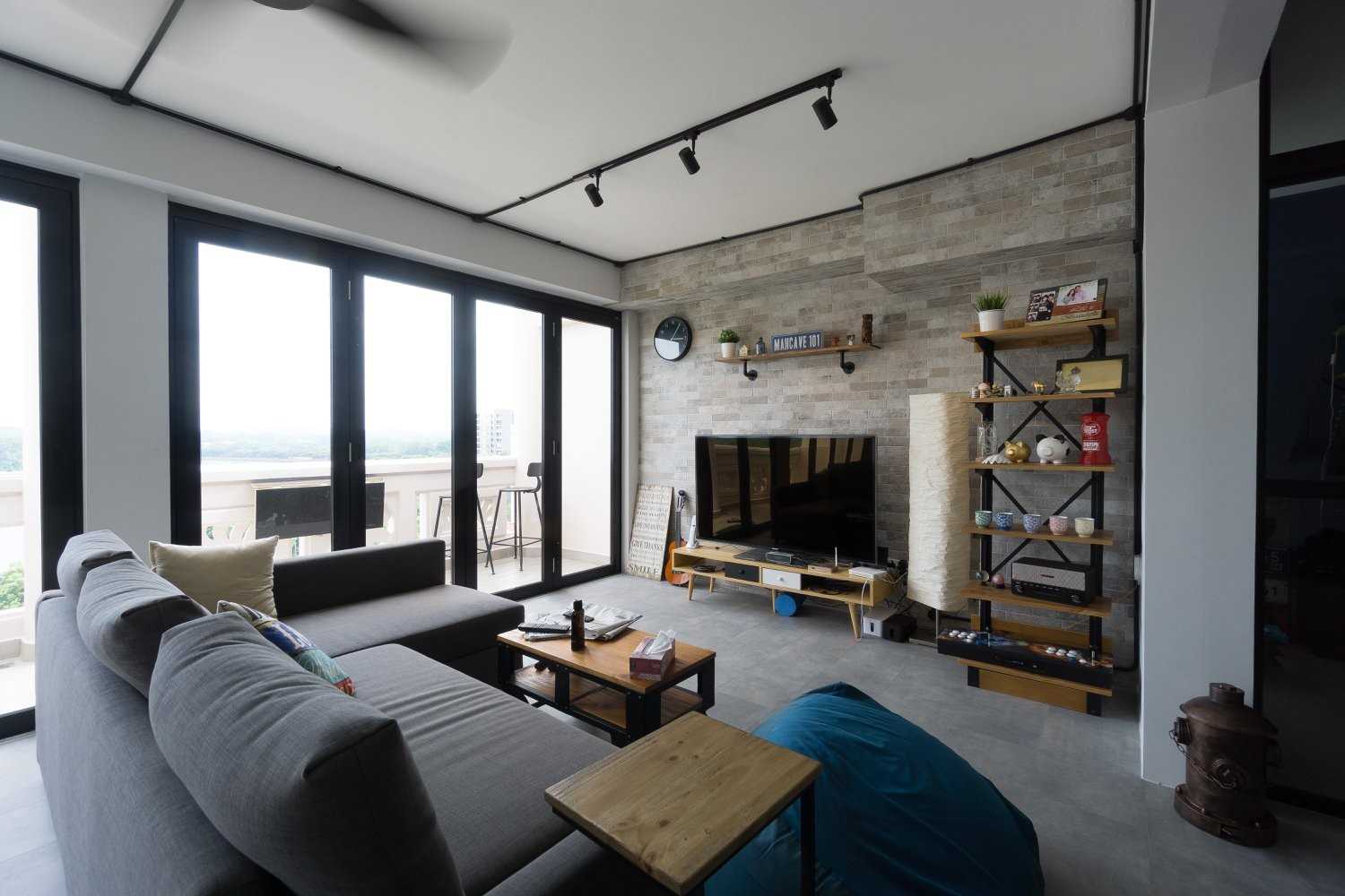 Industrial Living Room with Vinyl Flooring and Feature Wall