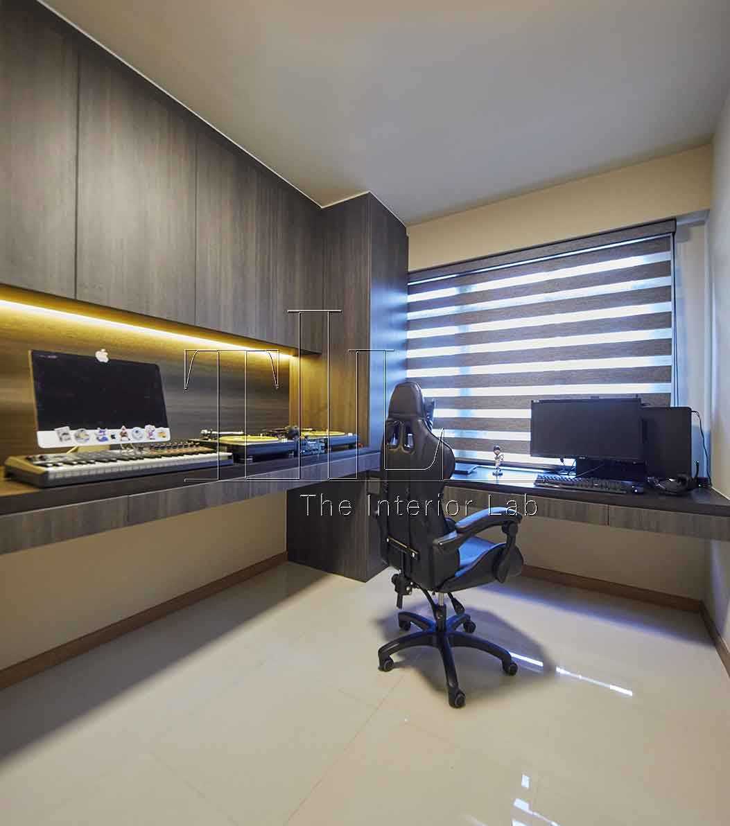 Contemporary Studio with Cove Lighting and Storage Cabinets