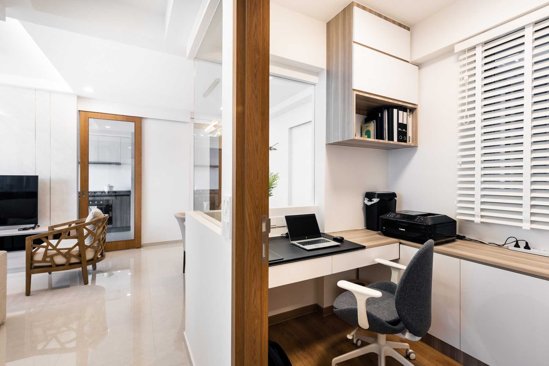 Minimalist Study with Bookshelf and Ceiling Light
