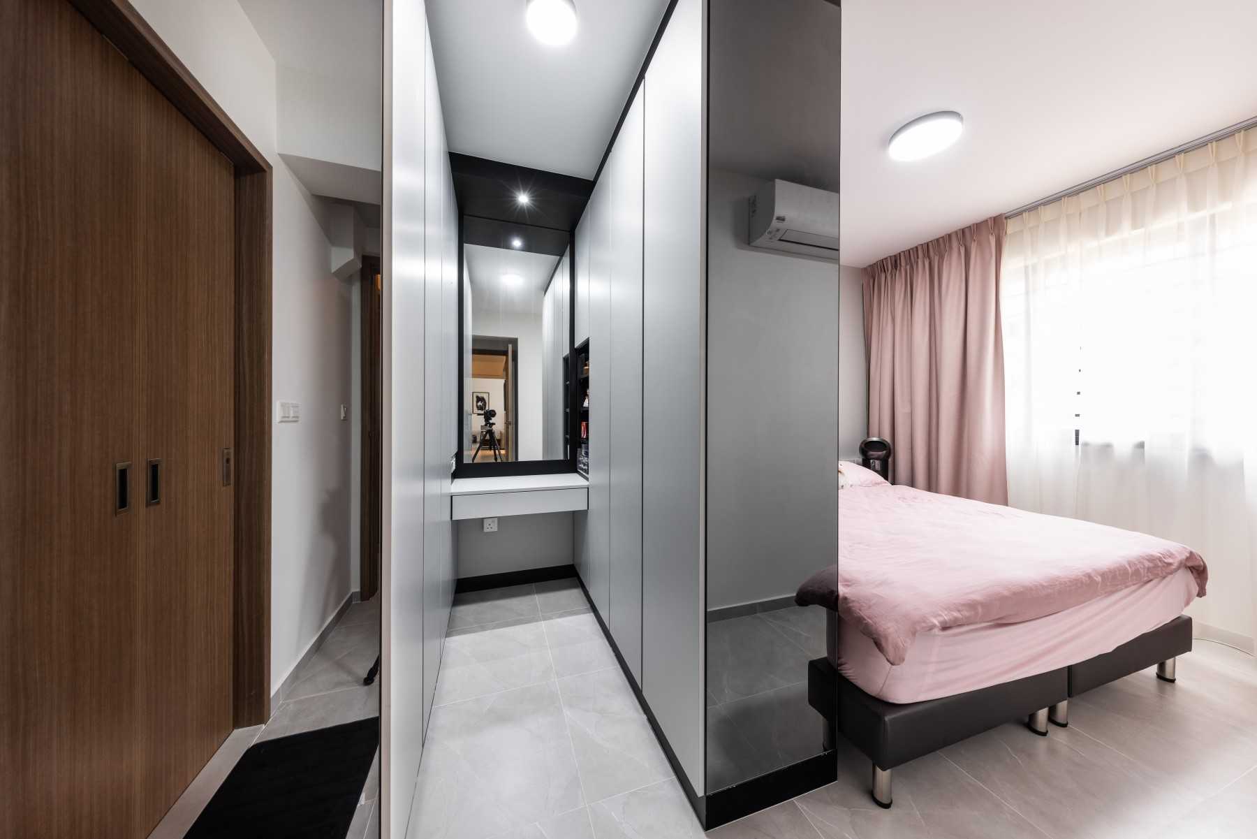 Contemporary Bedroom with Mirror and Ceiling Light