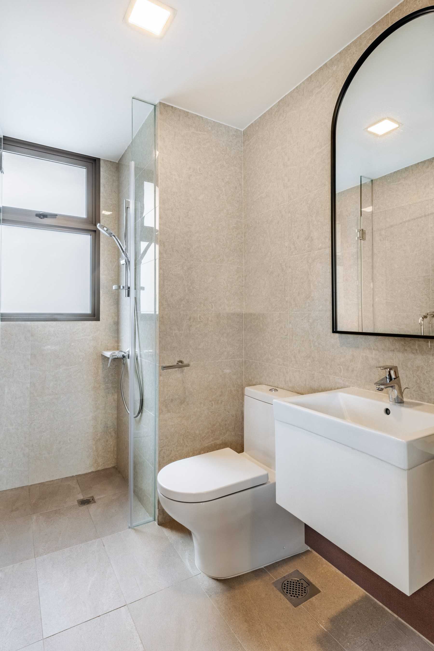Asian Bathroom with Homogeneous Tiles and Mirror