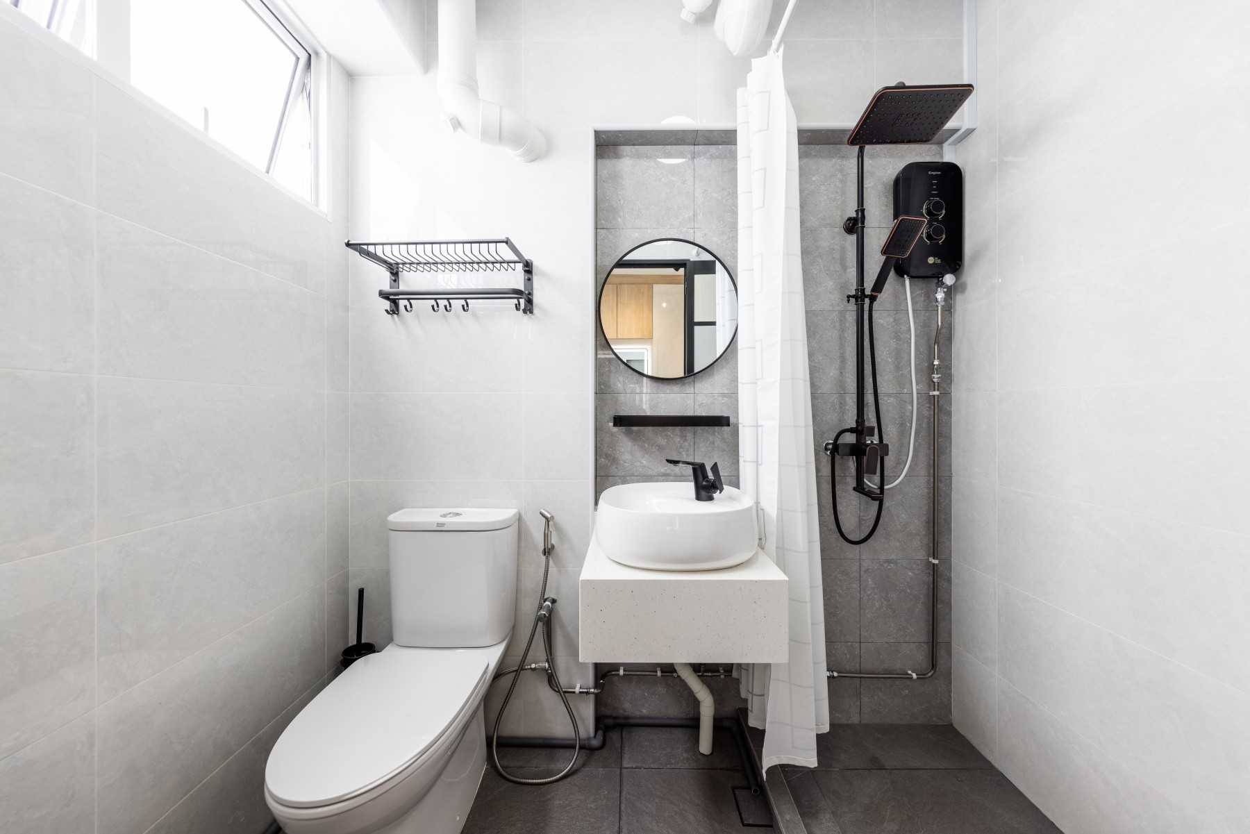Scandinavian Bathroom with Homogeneous Tiles and Bathroom Sinks