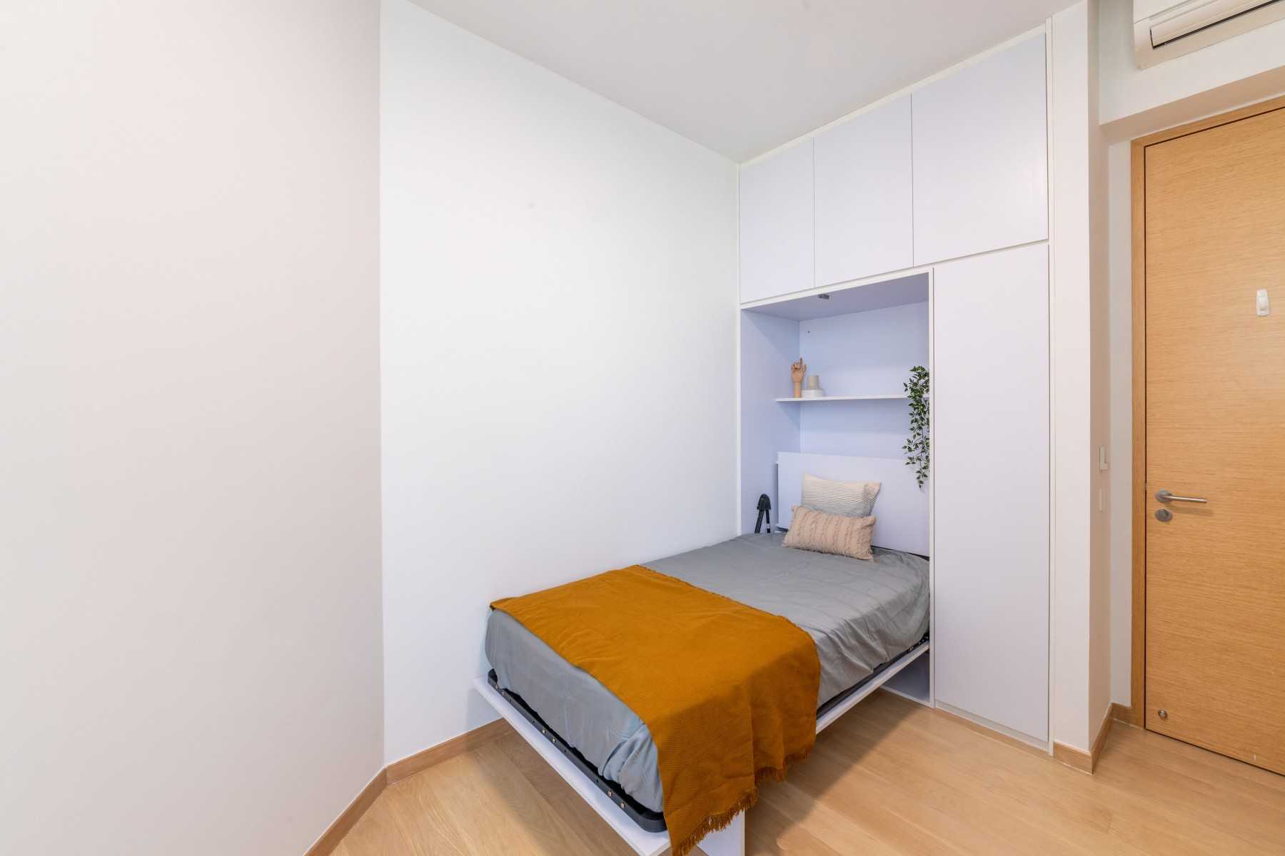 Minimalist Bedroom with Platform Bed and Wood Flooring