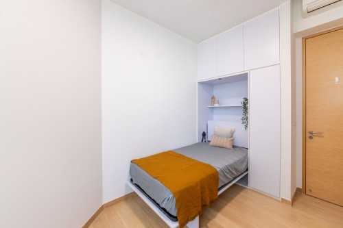 Minimalist Bedroom at The Crest Condo