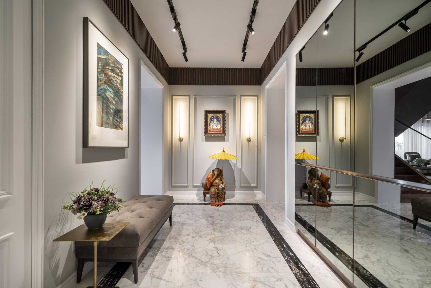 Contemporary Hallway with Drop Light and Mirror