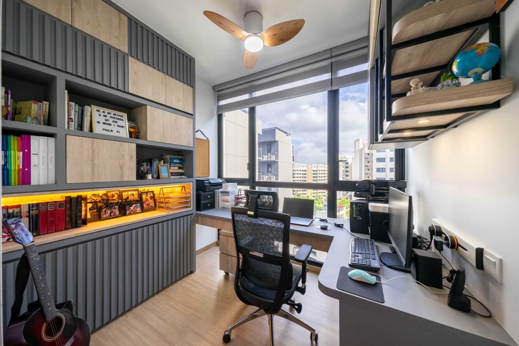 Modern Home Office with Bookshelf and Desk
