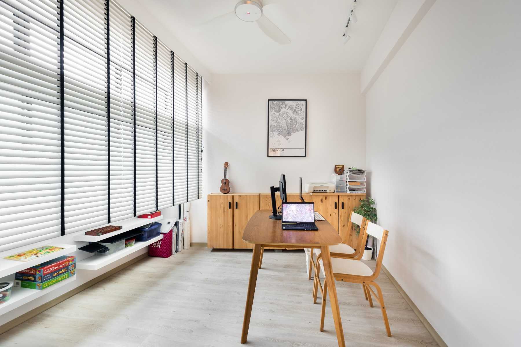 Minimalist Home Office with Desk and Desk Chairs