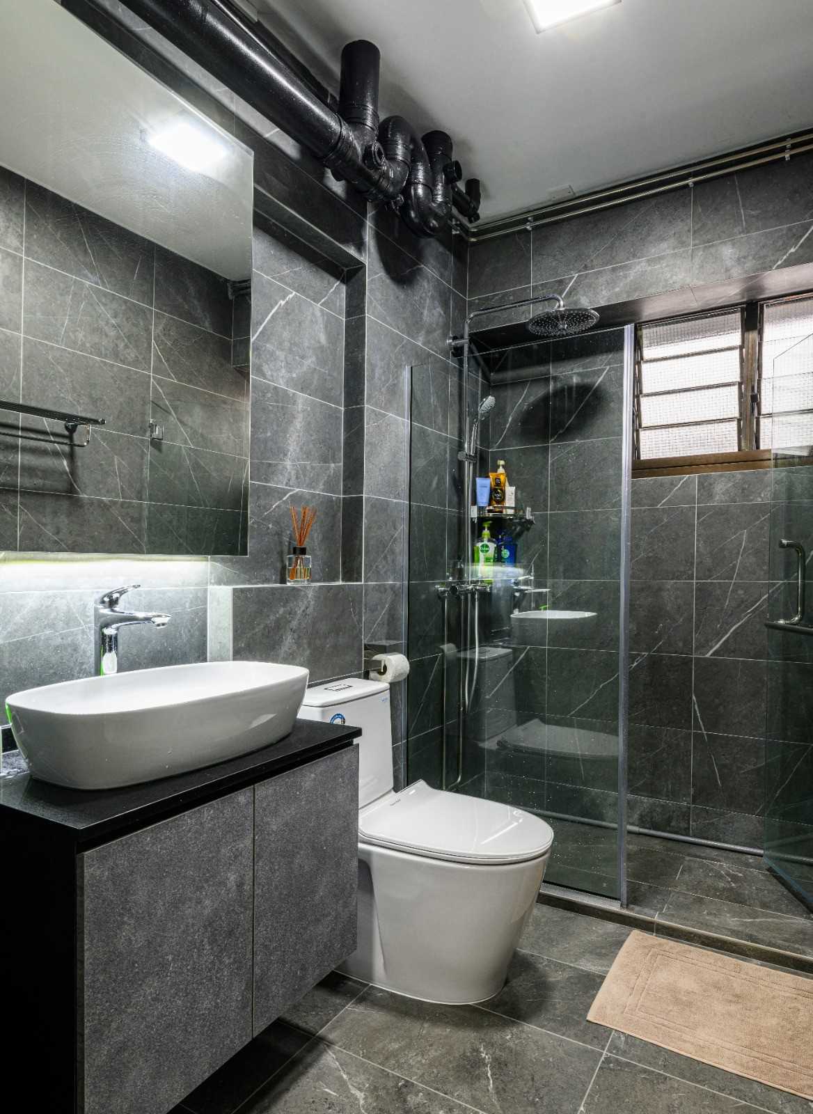 Industrial Bathroom with Marble Floor and Mirror