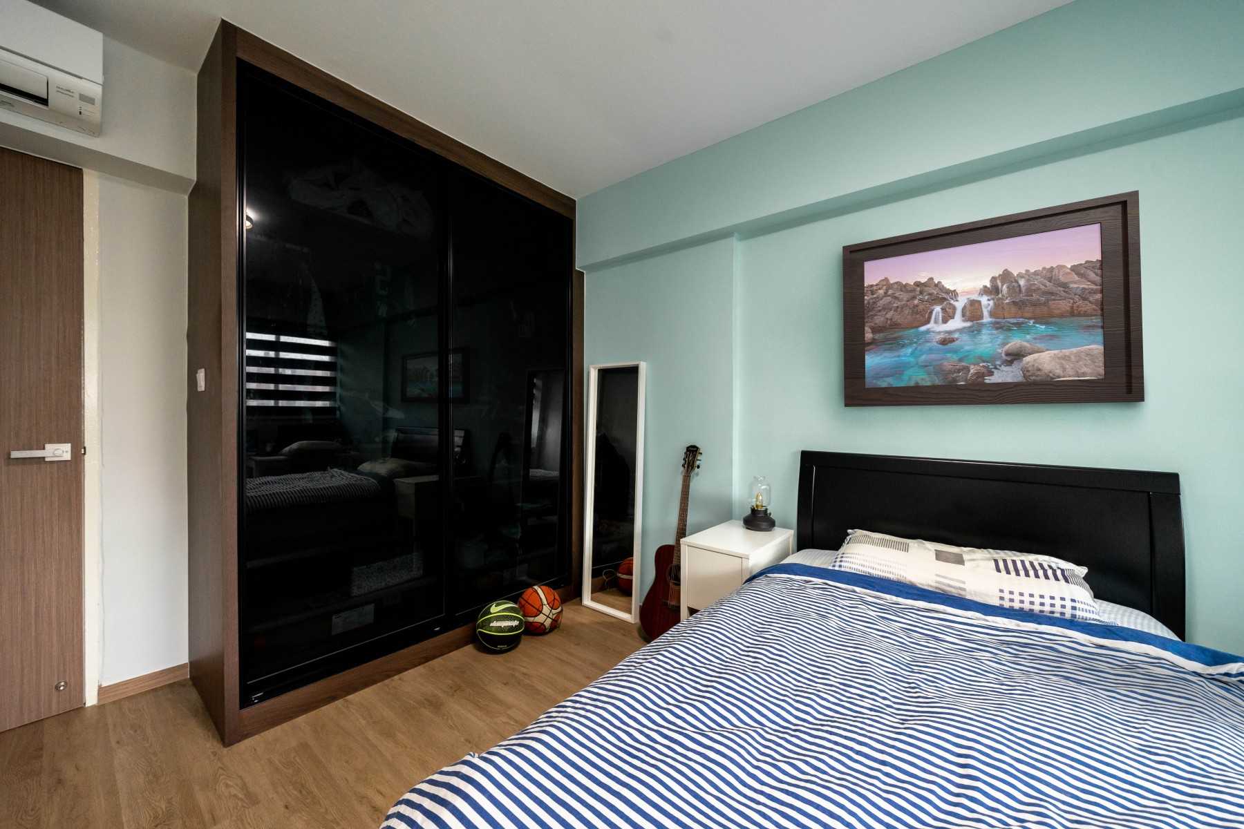 Contemporary Bedroom with Bedside Table and Children's Beds