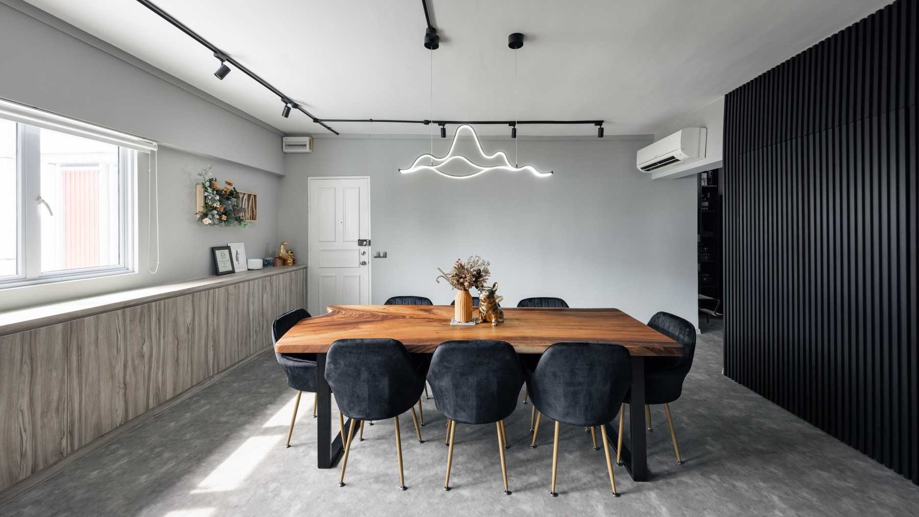 Industrial Dining Room with Cement Floor and Feature Wall