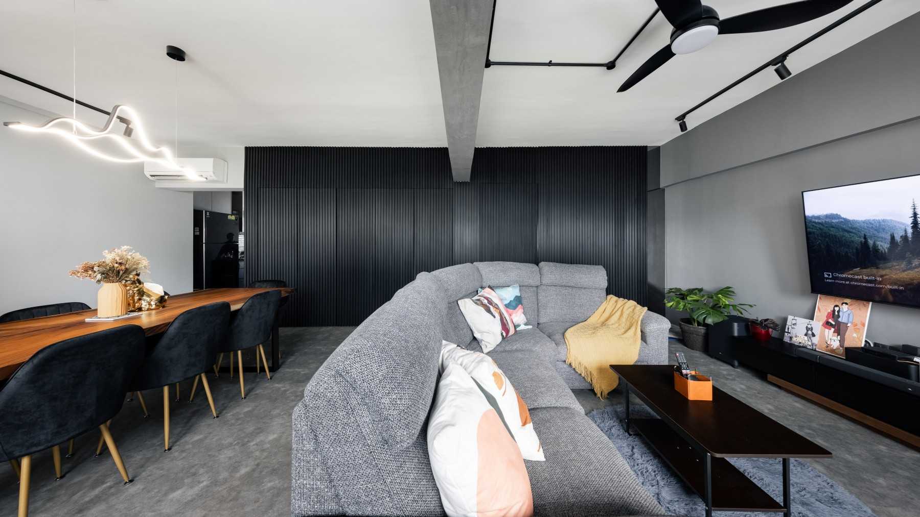 Industrial Living Room with Cement Floor and Feature Wall