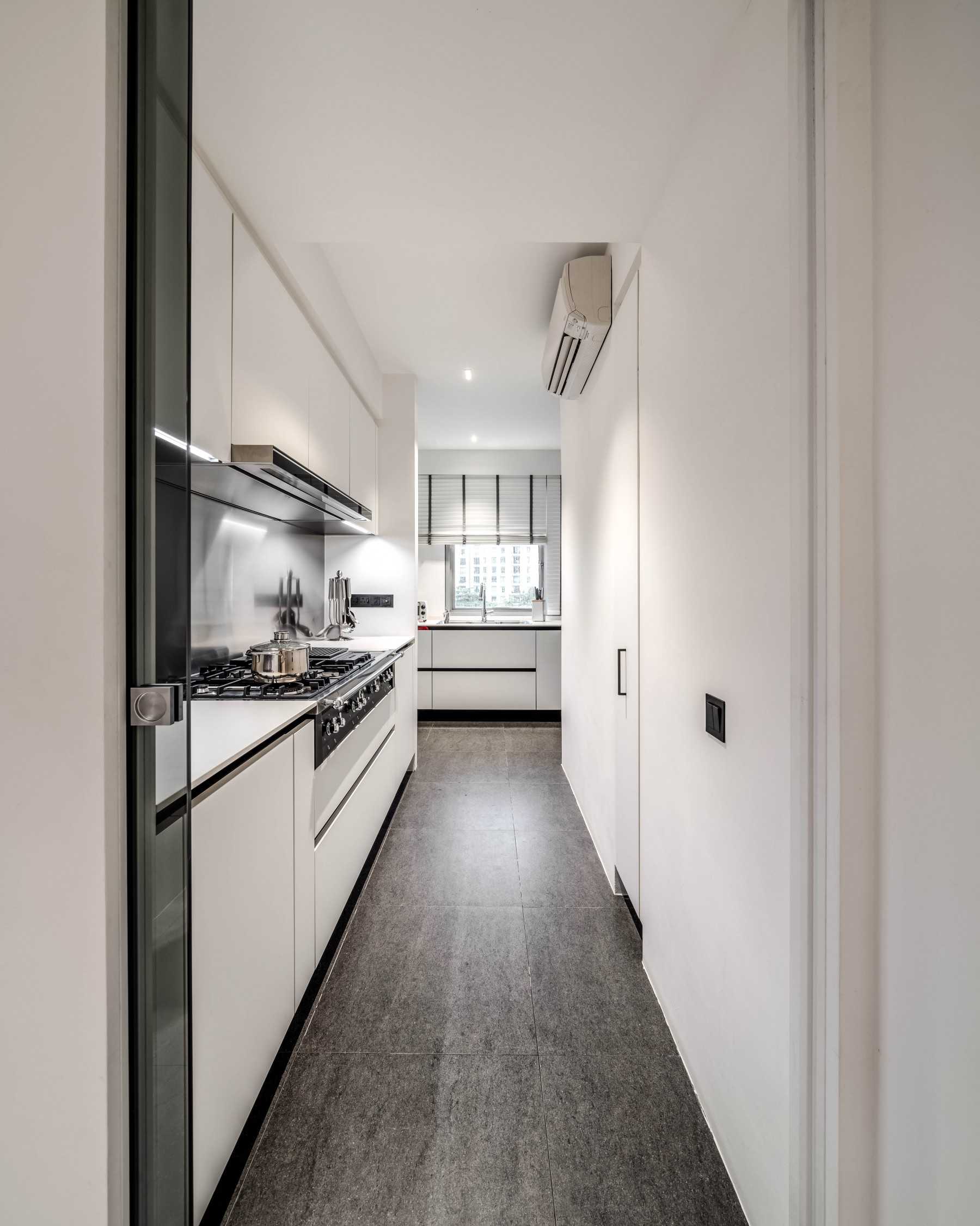 Minimalist Kitchen with Kitchen Cabinets and Flooring