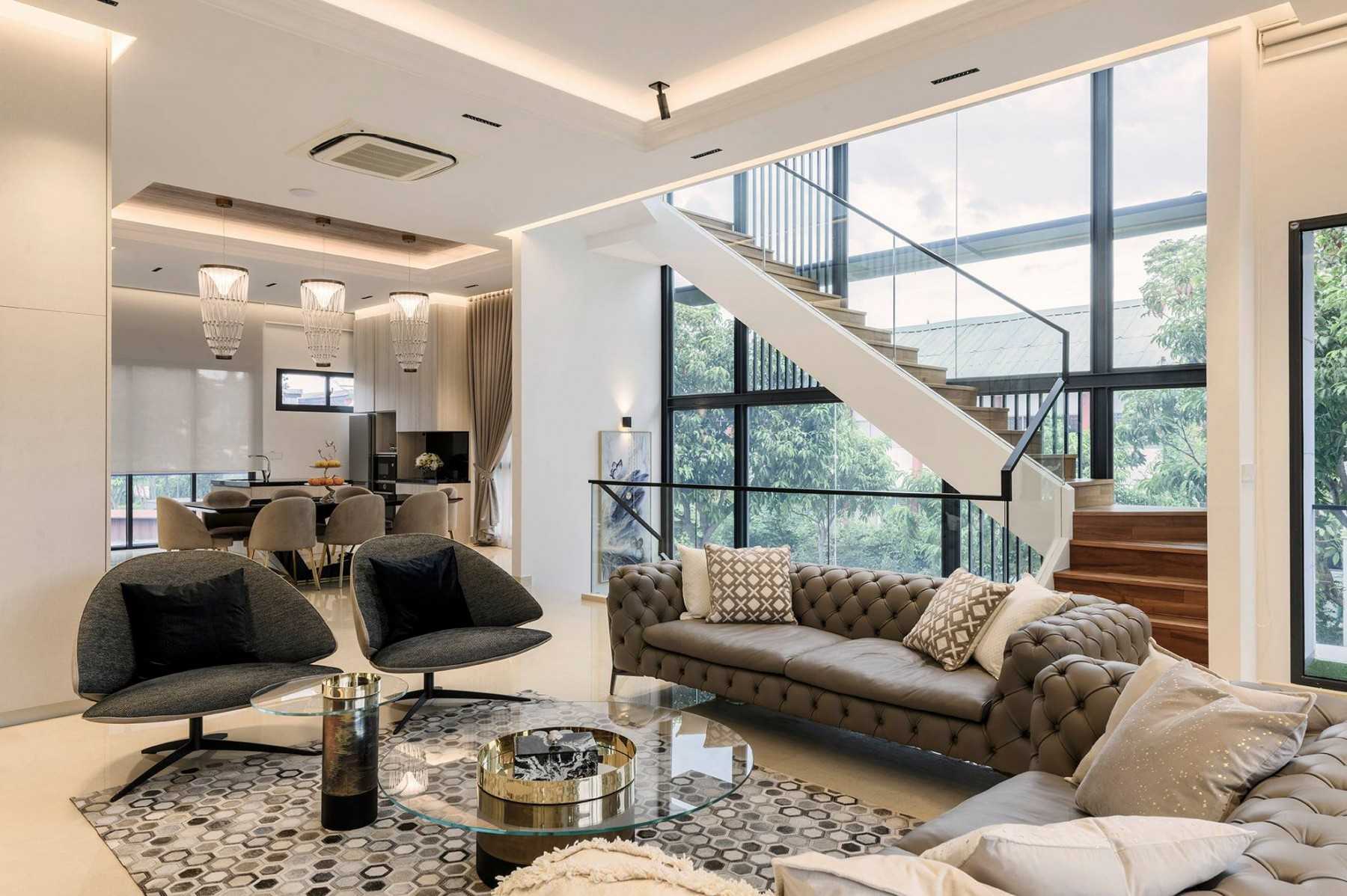 Contemporary Living Room with Herringbone Tiling and Cement Floor