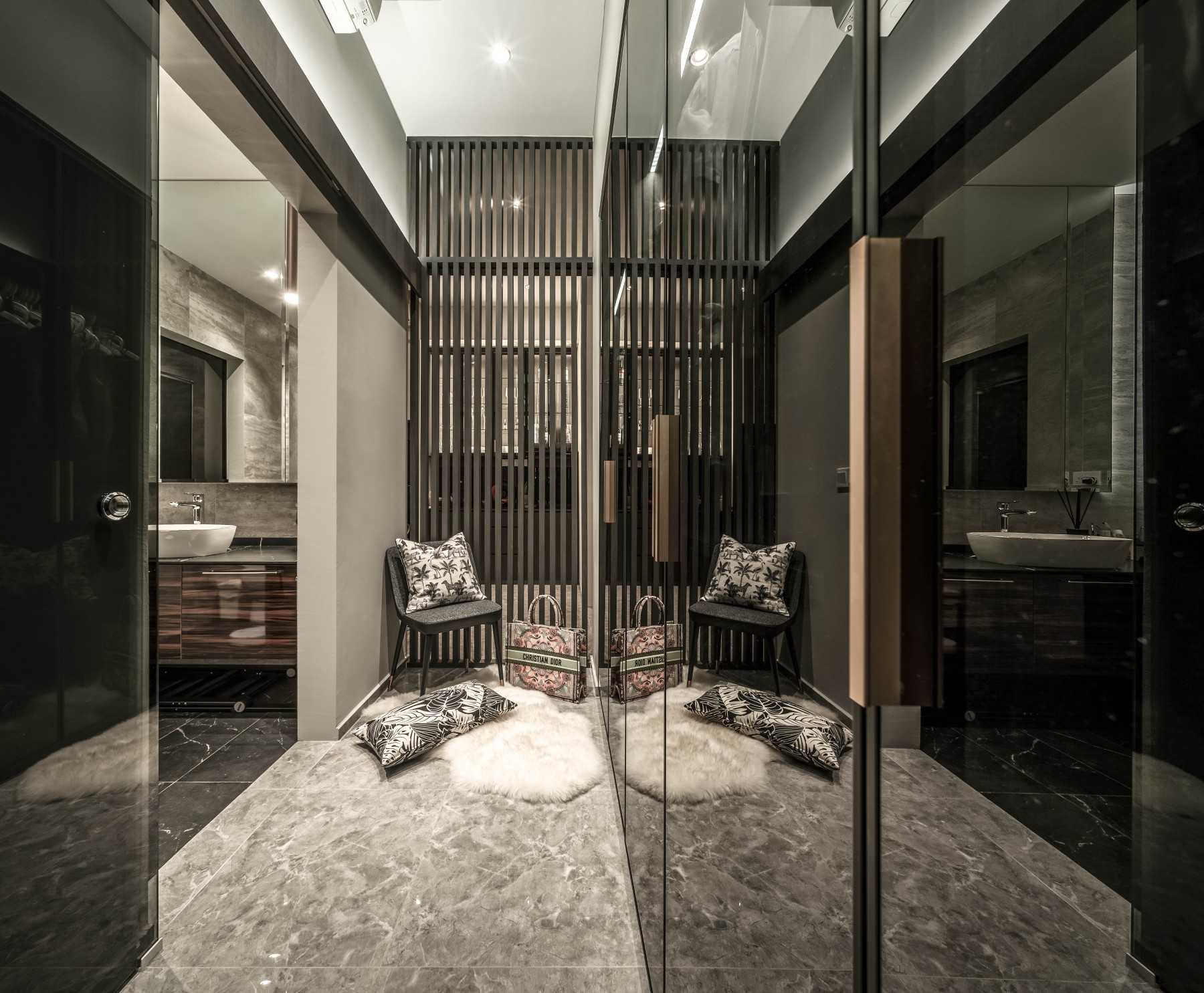 Contemporary Walk-in Wardrobe with Wardrobe and Armchairs