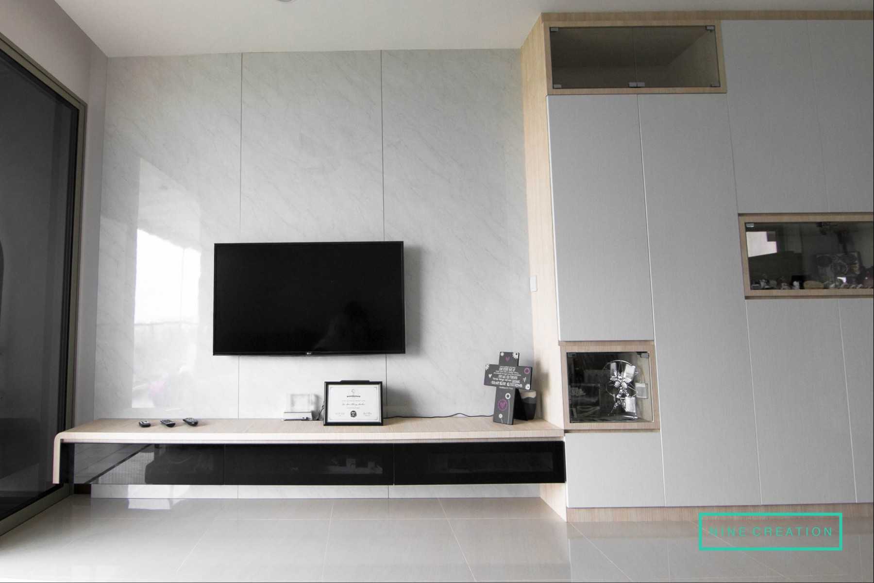 Modern Living Room with Bookshelf and TV Console