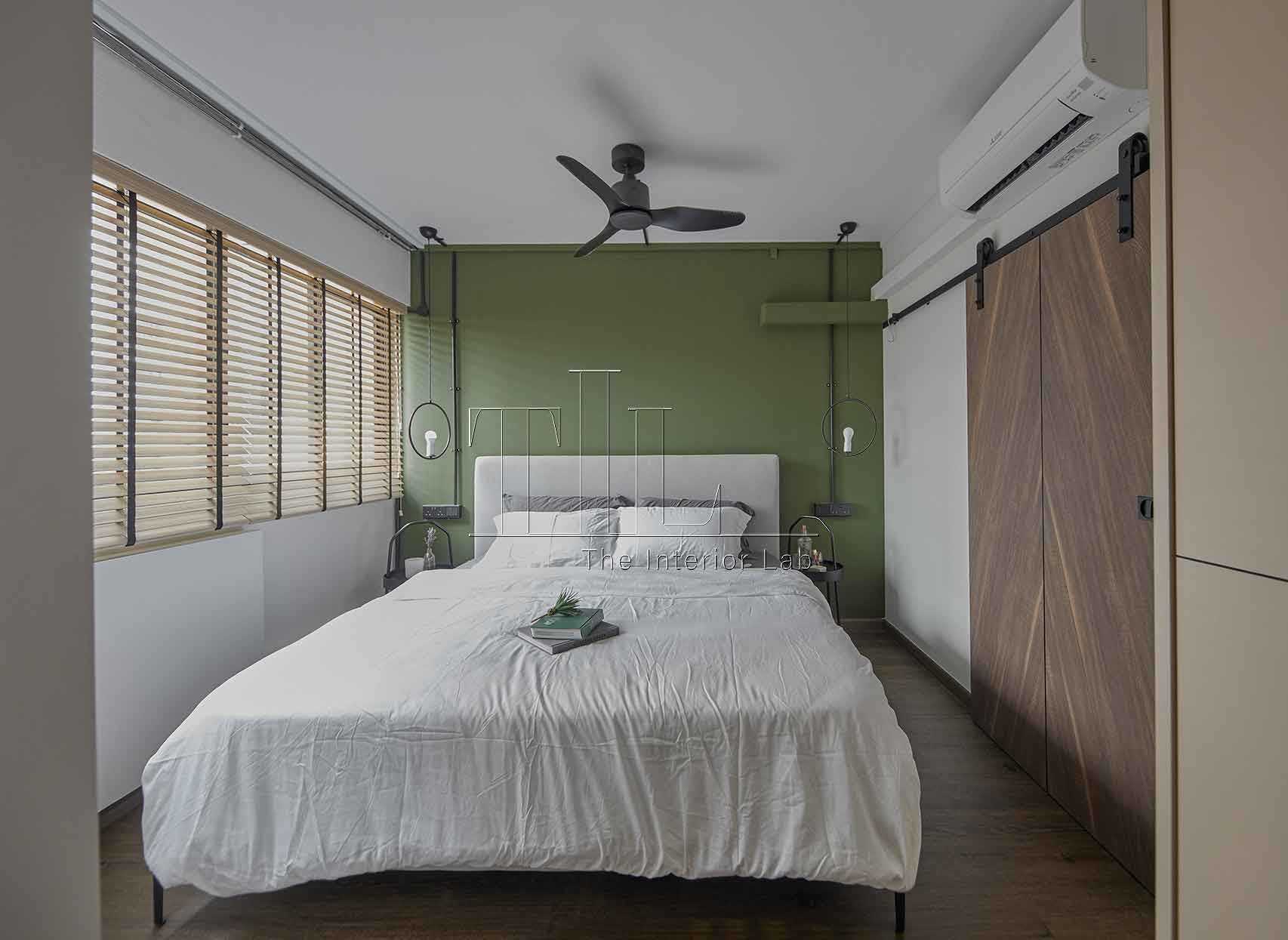 Eclectic Bedroom with Wood Flooring and Bedside Table