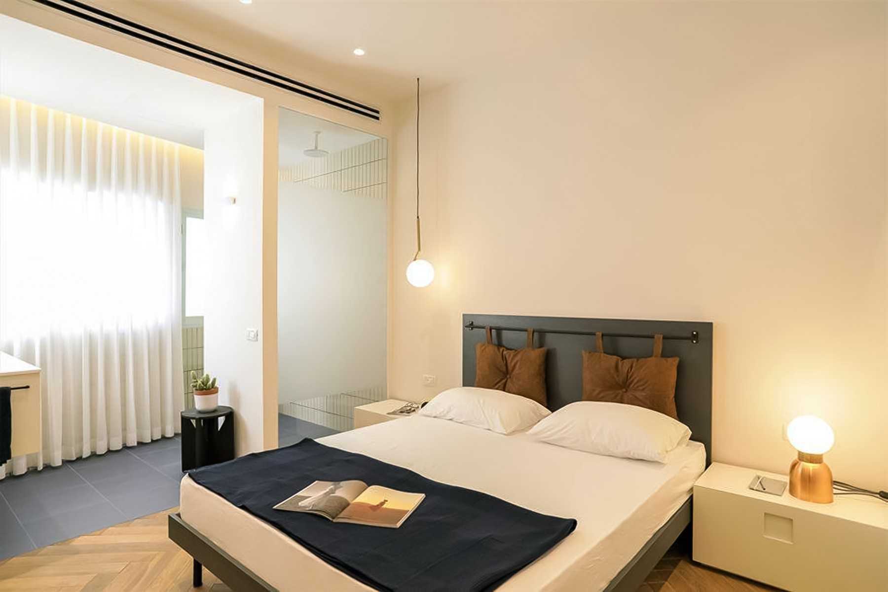 Contemporary Bedroom with Platform Bed and Vinyl Flooring