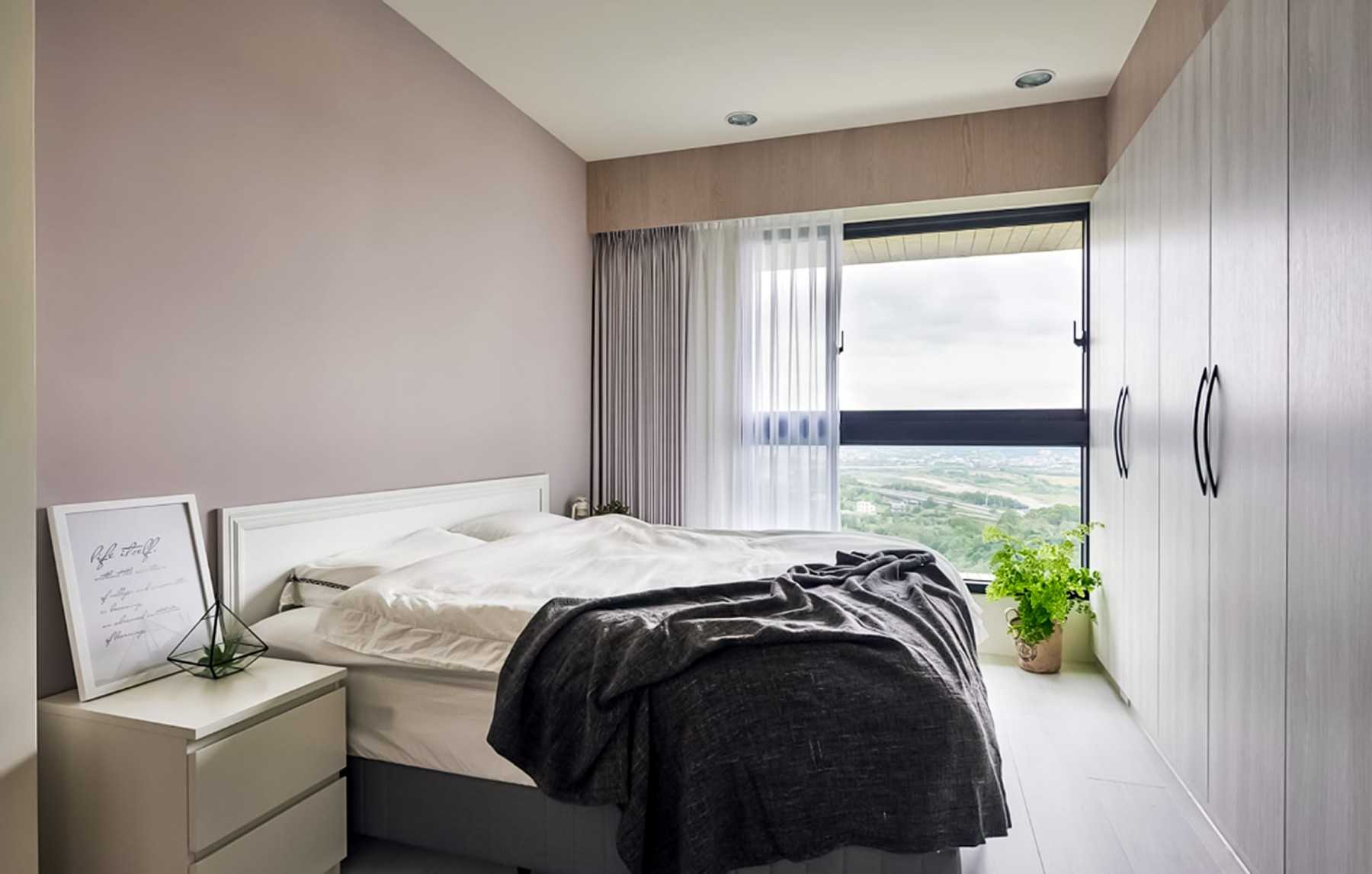 Contemporary Bedroom with Herringbone Tiling and Ceiling Light