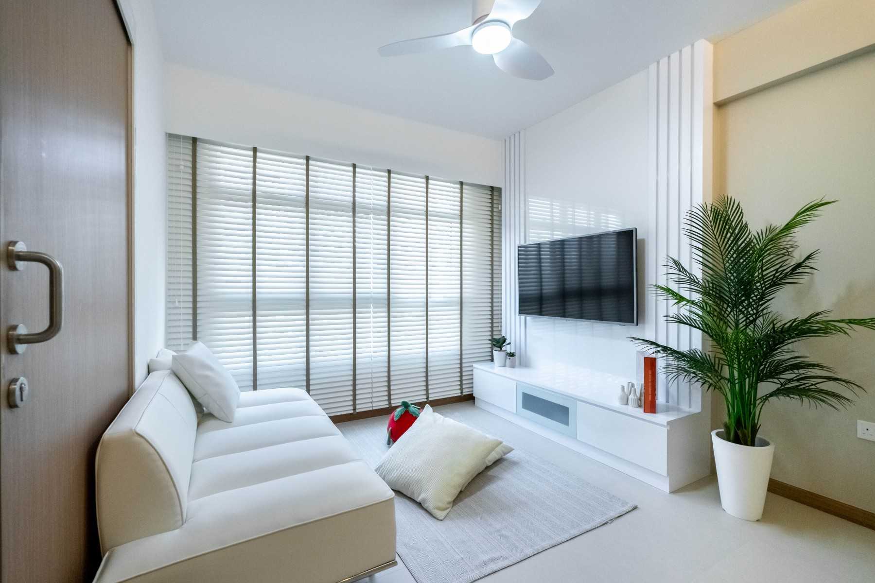Minimalist Living Room with TV Console and Feature Wall