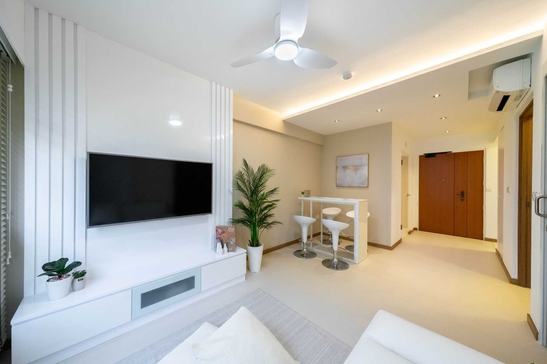 Minimalist Living Room with TV Console and Feature Wall