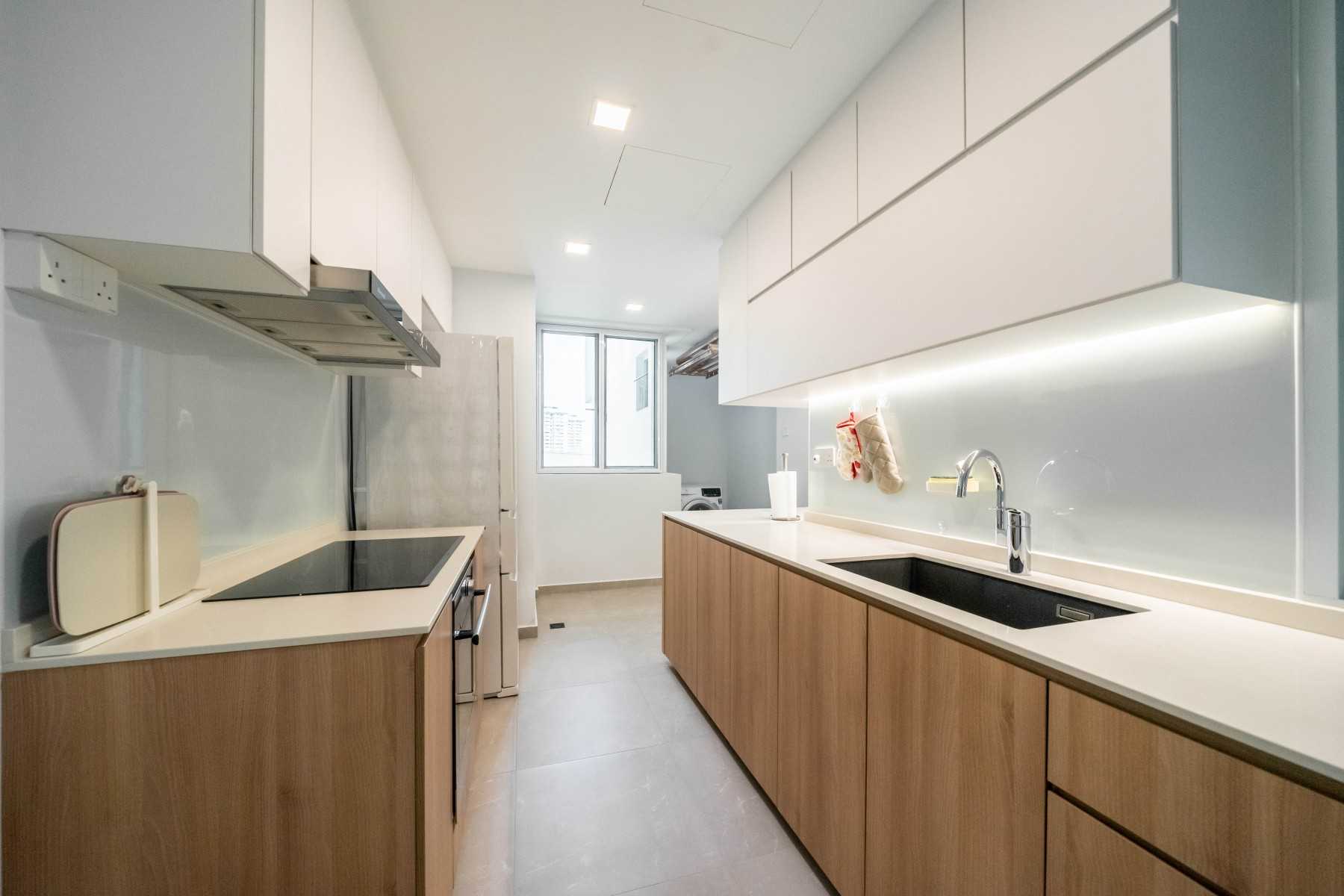 Contemporary Kitchen with Herringbone Tiling and Kitchen Window