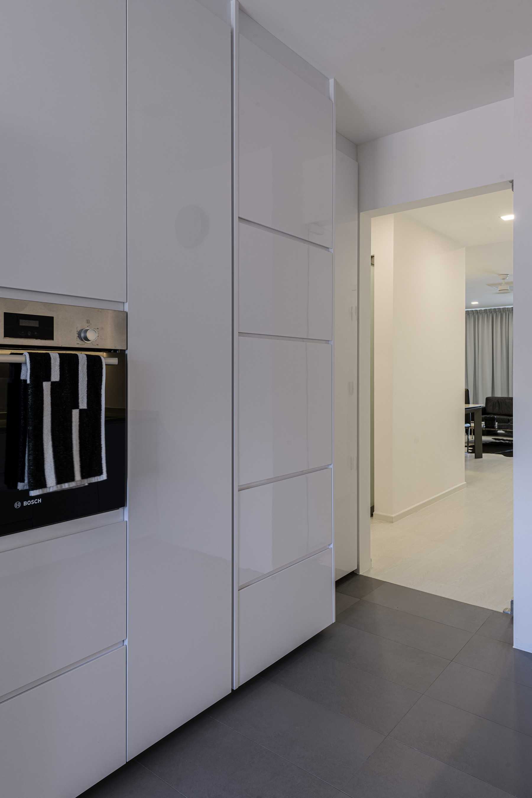 Minimalist Kitchen with Parquet Floor and Cement Floor