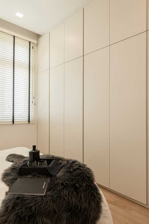 Minimalist Bedroom at 2 Storey Apartment at Bowmont Centre