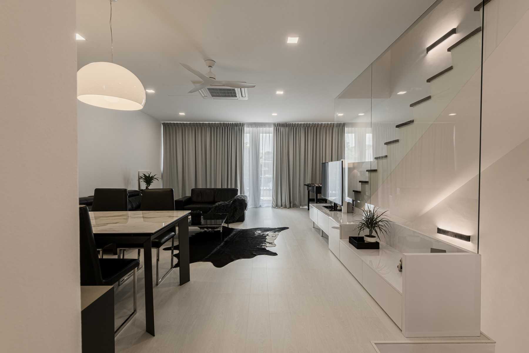 Minimalist Living Room with Herringbone Tiling and Cement Floor