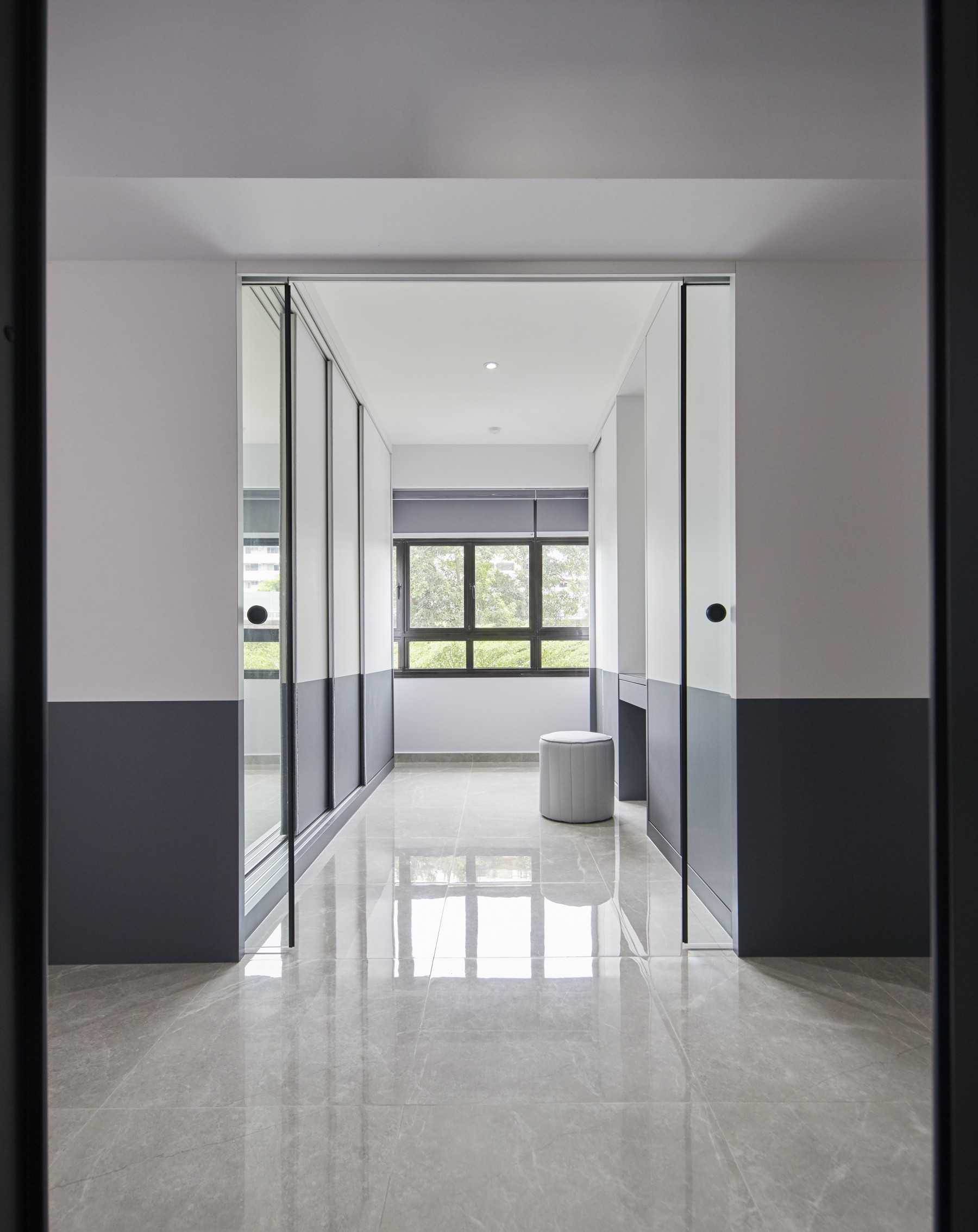 Contemporary Bedroom with Homogeneous Tiles and Glass Door