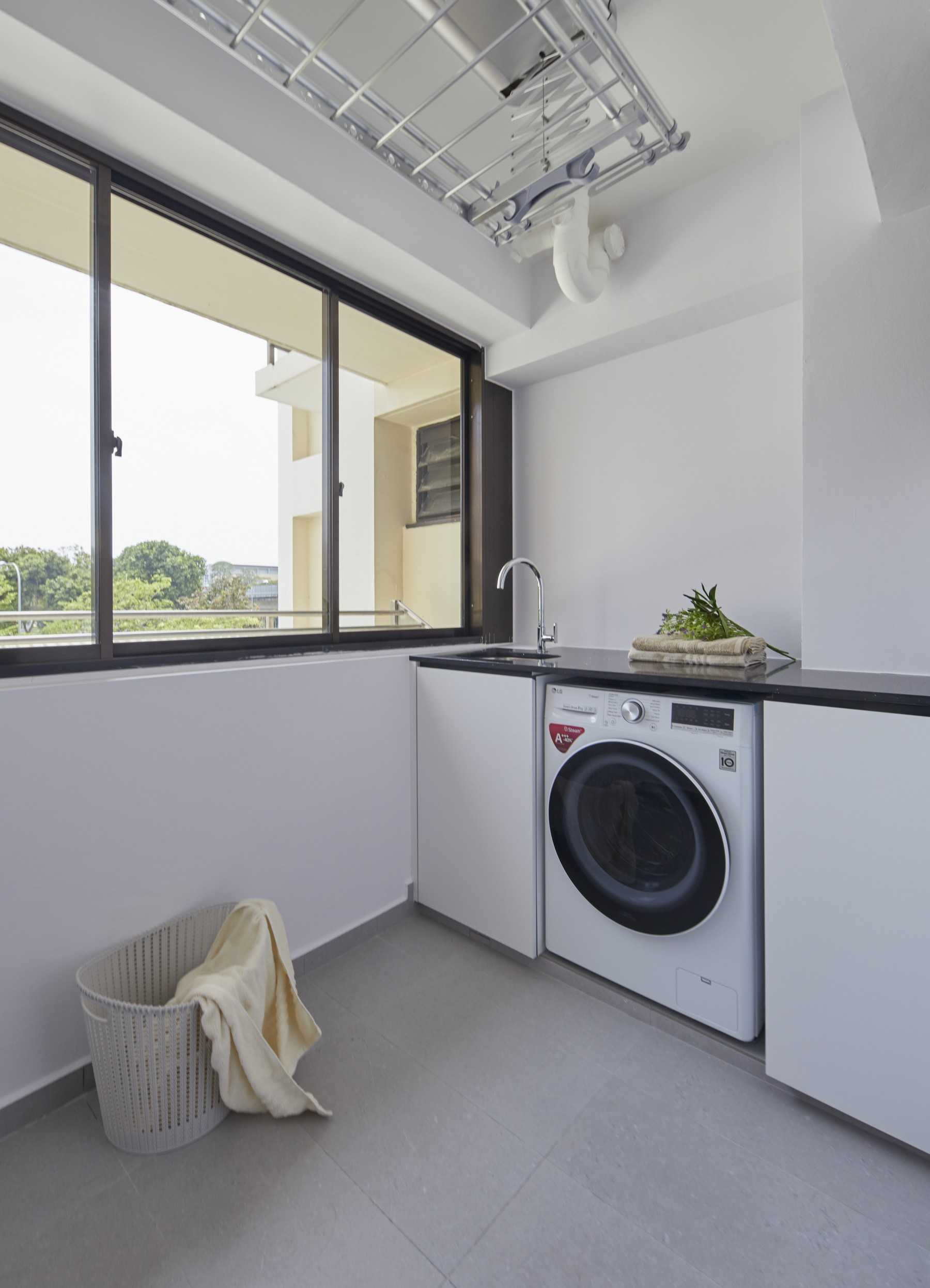 Contemporary Service Yard with Washing Machine and Laundry Area