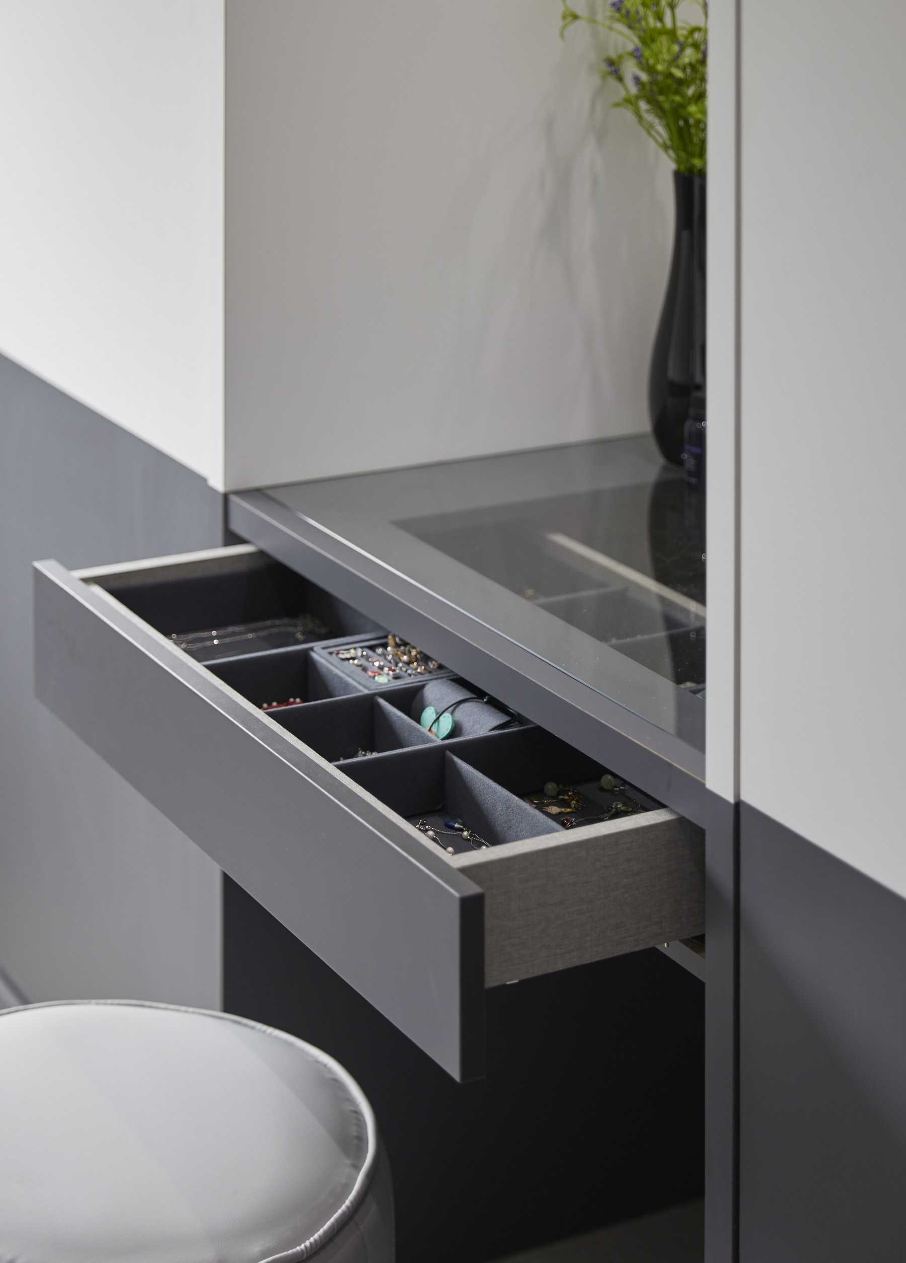Contemporary Bedroom with Glass Door and Vanity Counter