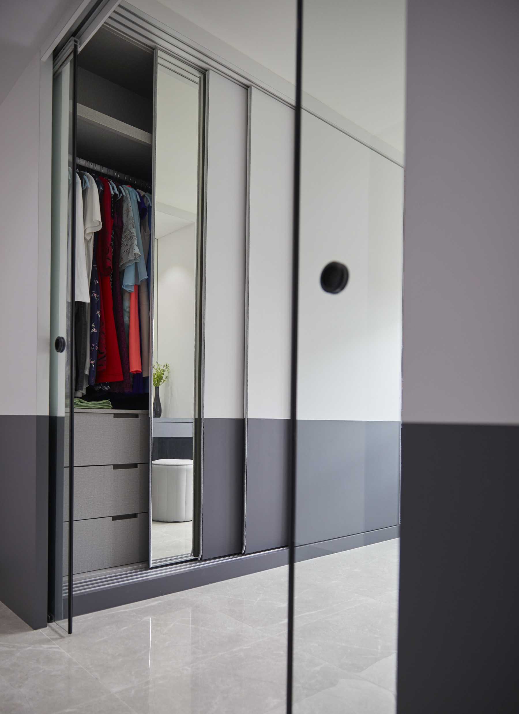 Contemporary Bedroom with Homogeneous Tiles and Glass Door
