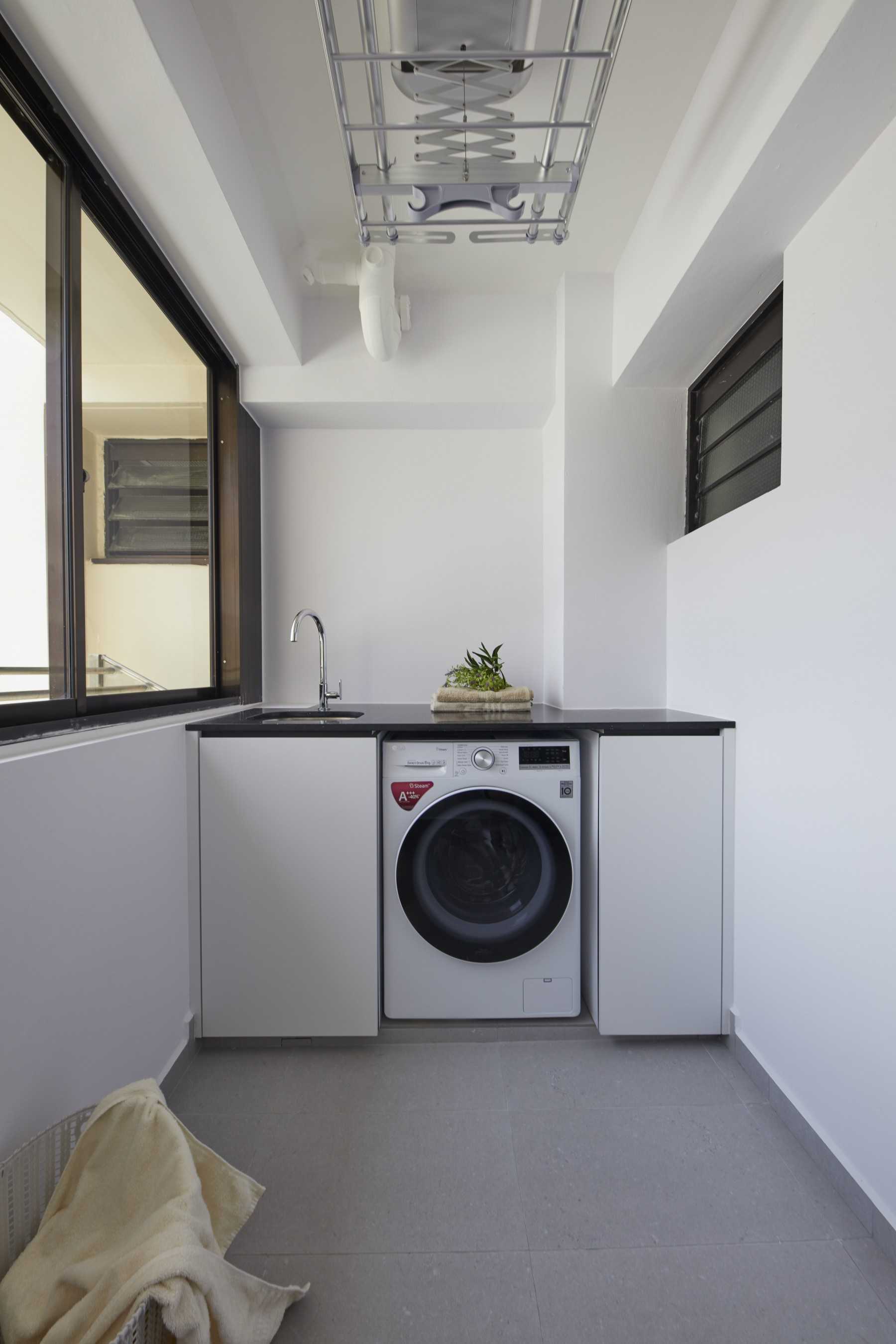 Contemporary Service Yard with Washing Machine and Laundry Area