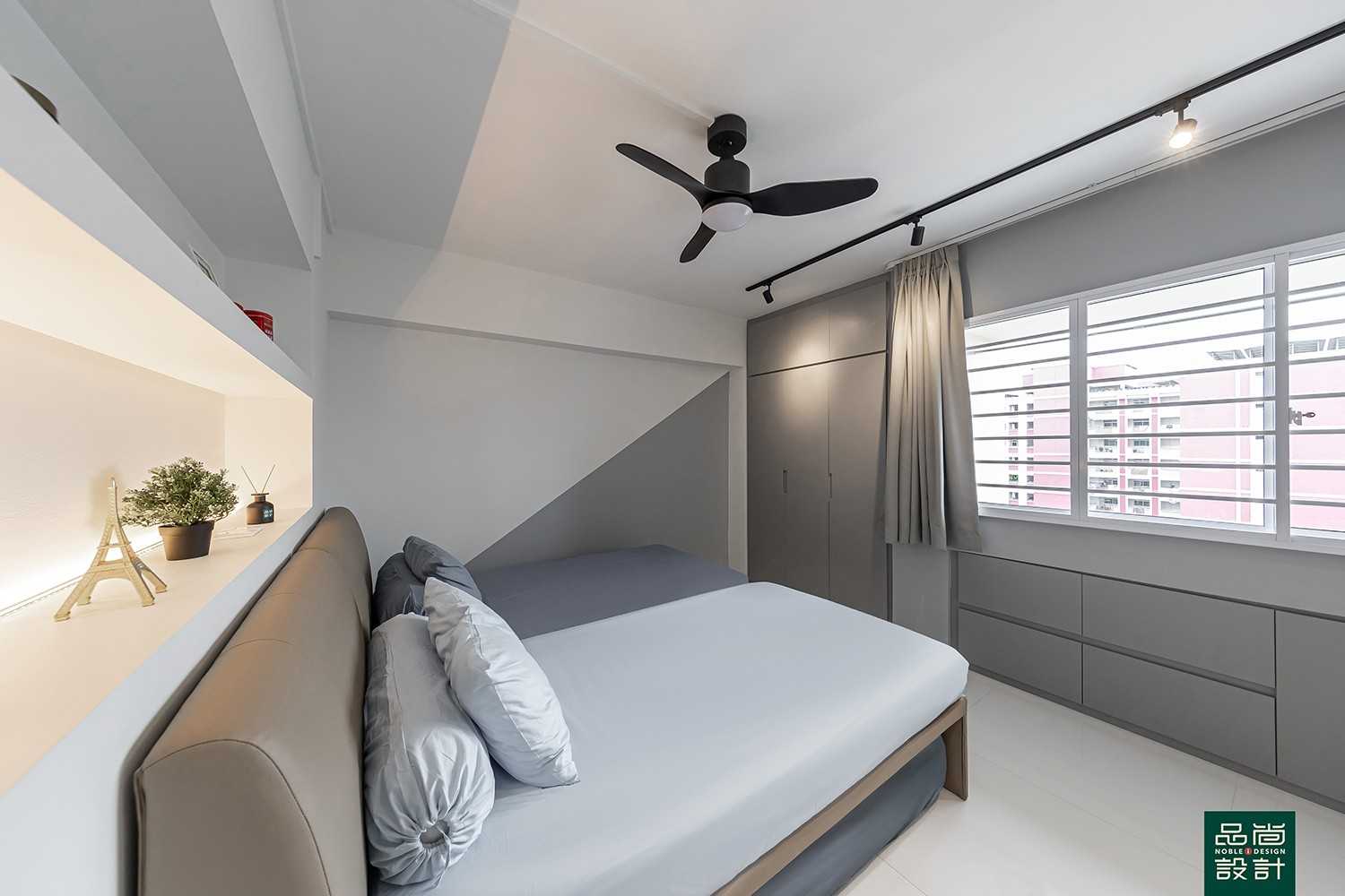 Modern Bedroom with Wardrobe and Paintings
