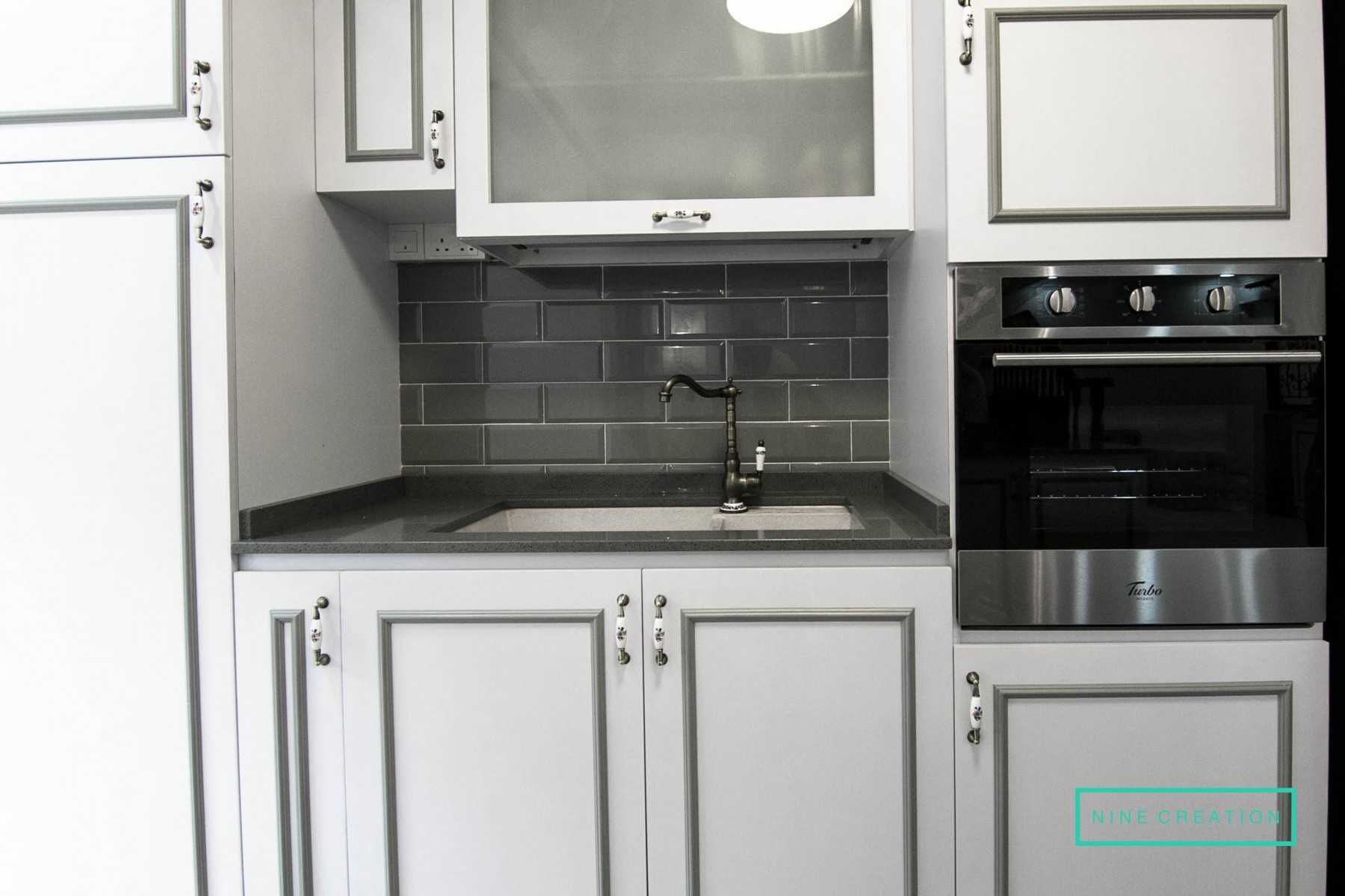 Vintage Kitchen with Countertop and Kitchen Backsplash