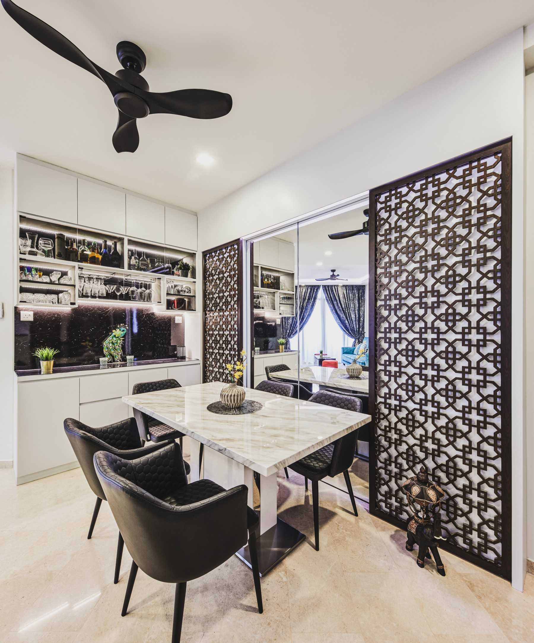 Transitional Dining Room with Mirror and Bar Counter
