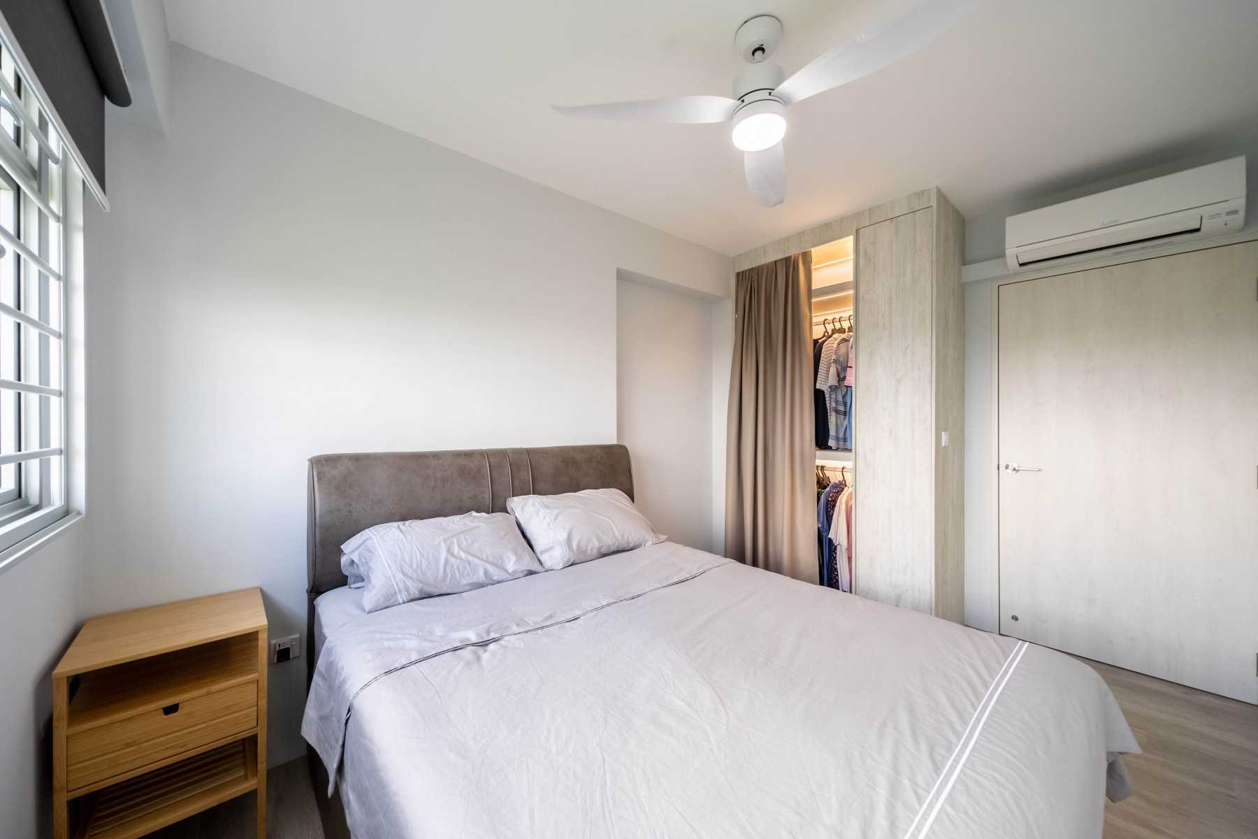 Industrial Bedroom with Vinyl Flooring and Queen Bed