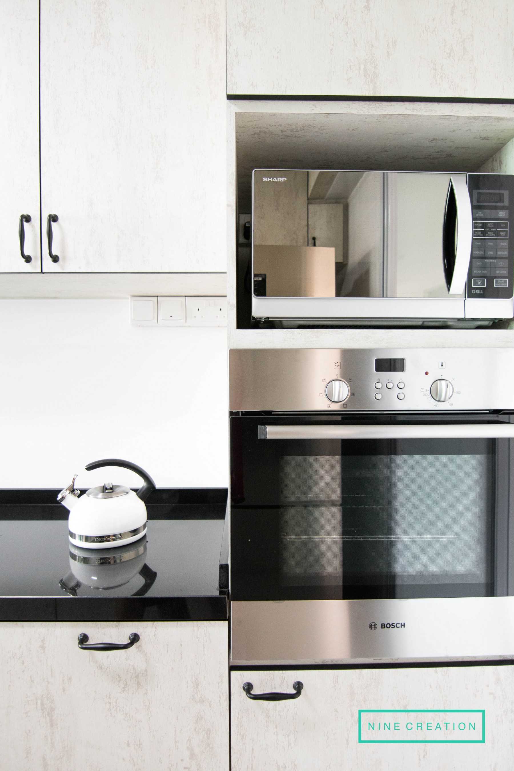 Modern Kitchen with Countertop and Kitchen Backsplash