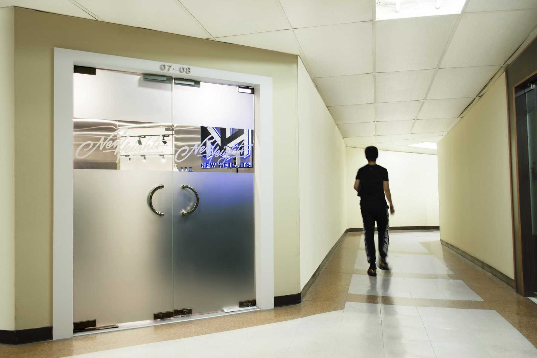 Contemporary Hallway with Glass Door and Ceiling Light