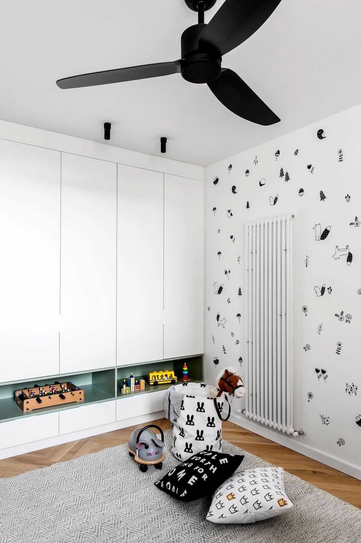 Contemporary Living Room with Bookshelf and Herringbone Tiling