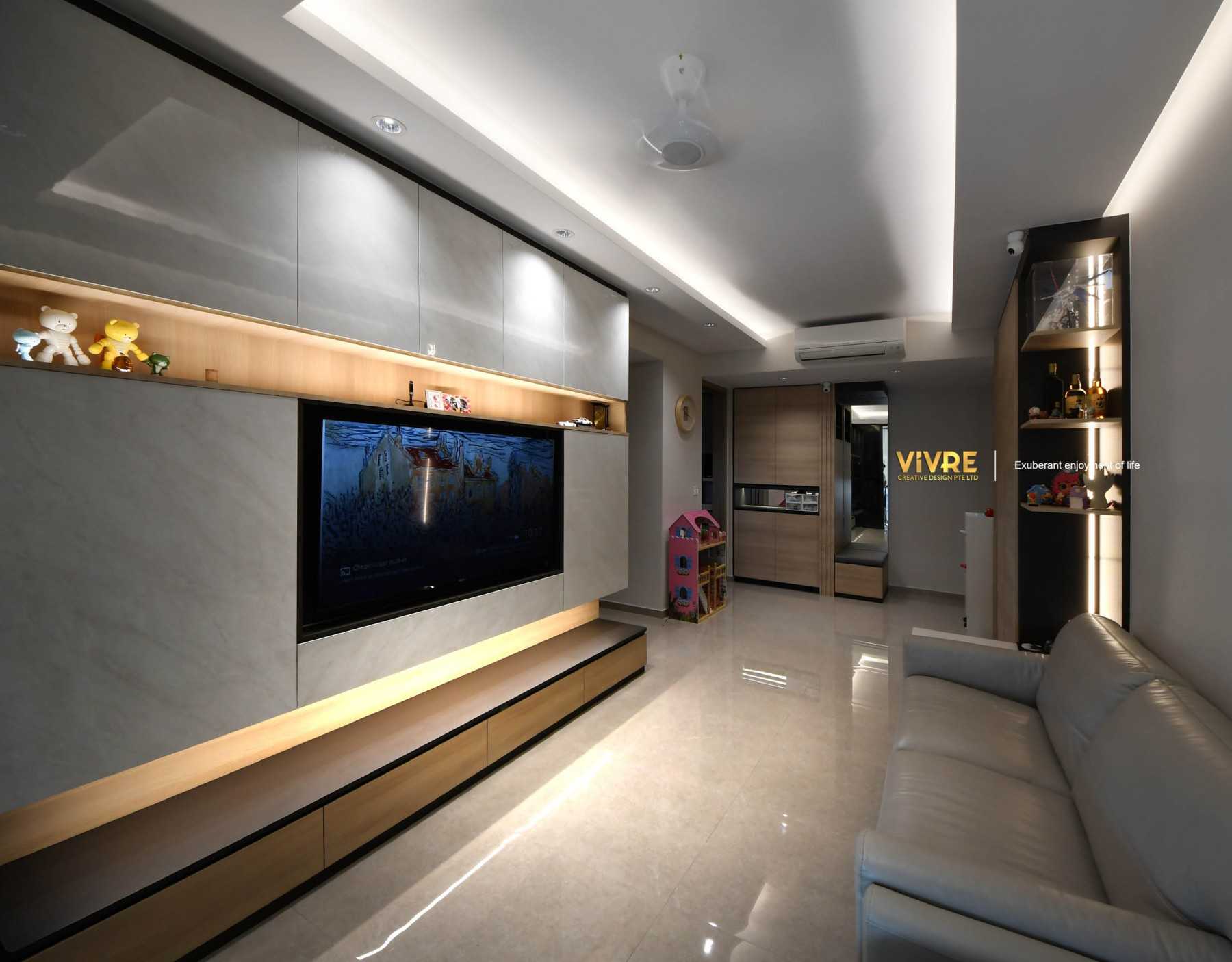 Modern Living Room with Bookshelf and Homogeneous Tiles