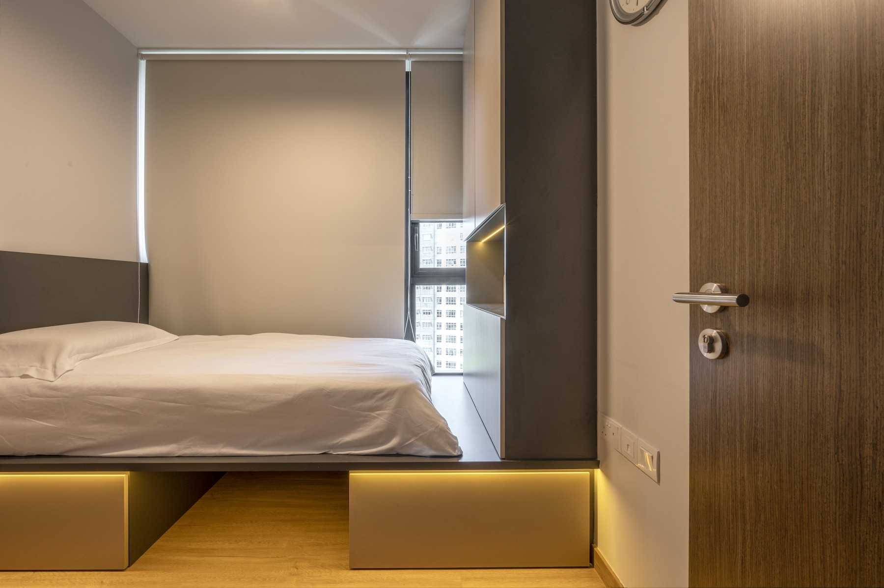 Modern Bedroom with Platform Bed and Wood Flooring