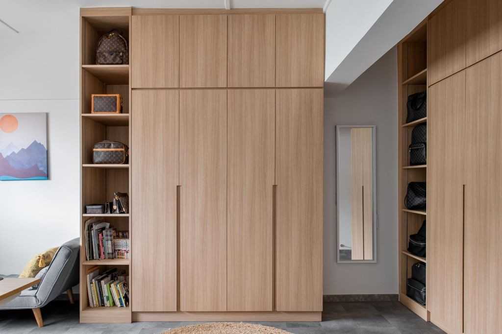 Minimalist Bedroom with Wood Flooring and Wardrobe