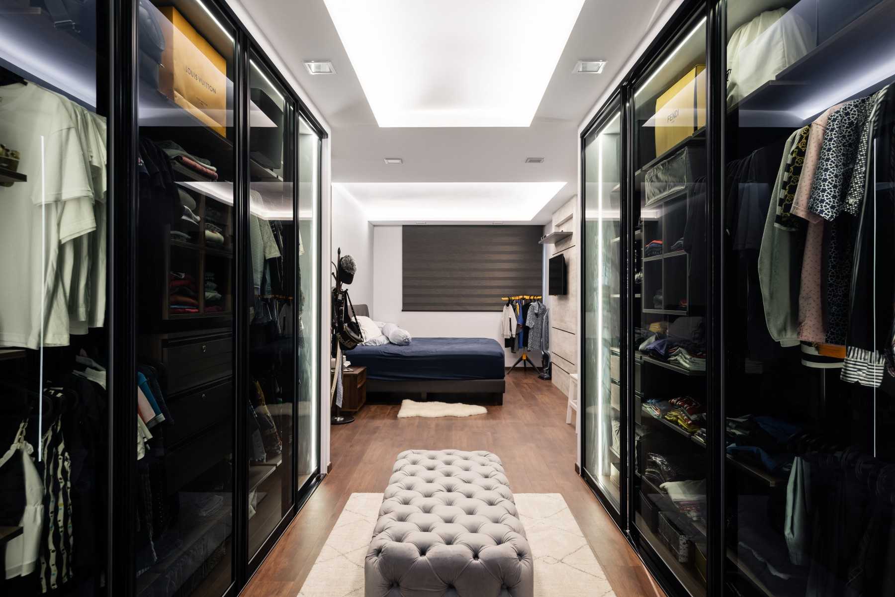 Contemporary Walk-in Wardrobe with Feature Wall and Wardrobe