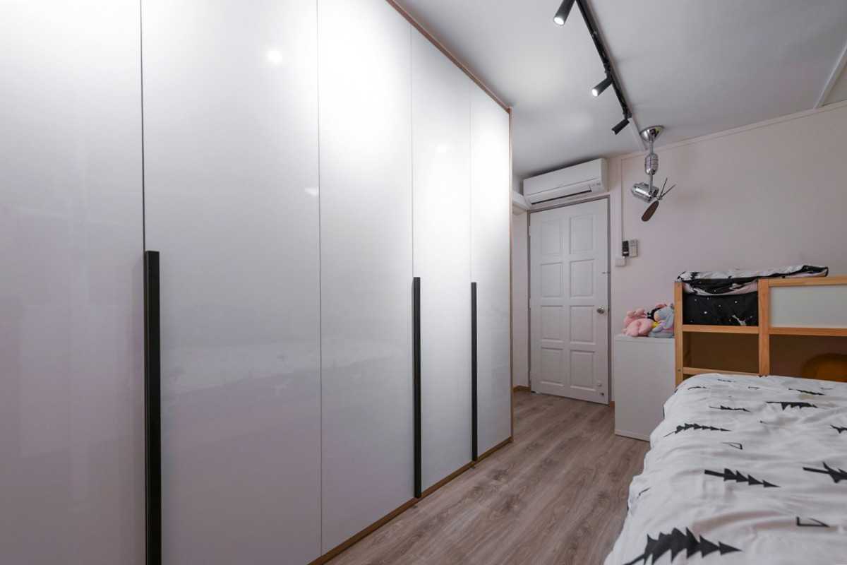 Scandinavian Bedroom with Vinyl Flooring and Wood Flooring
