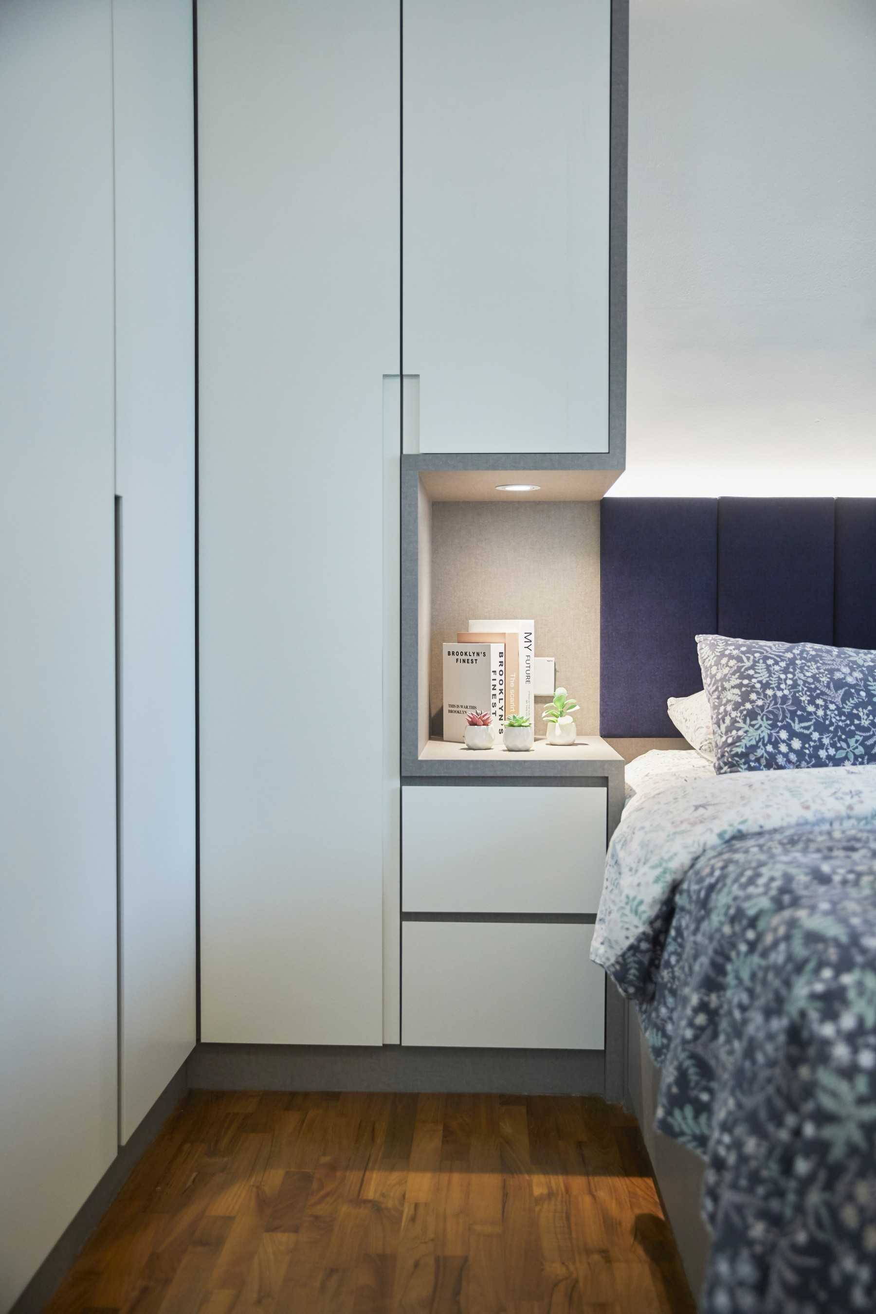 Scandinavian Bedroom with Wood Flooring and Wardrobe