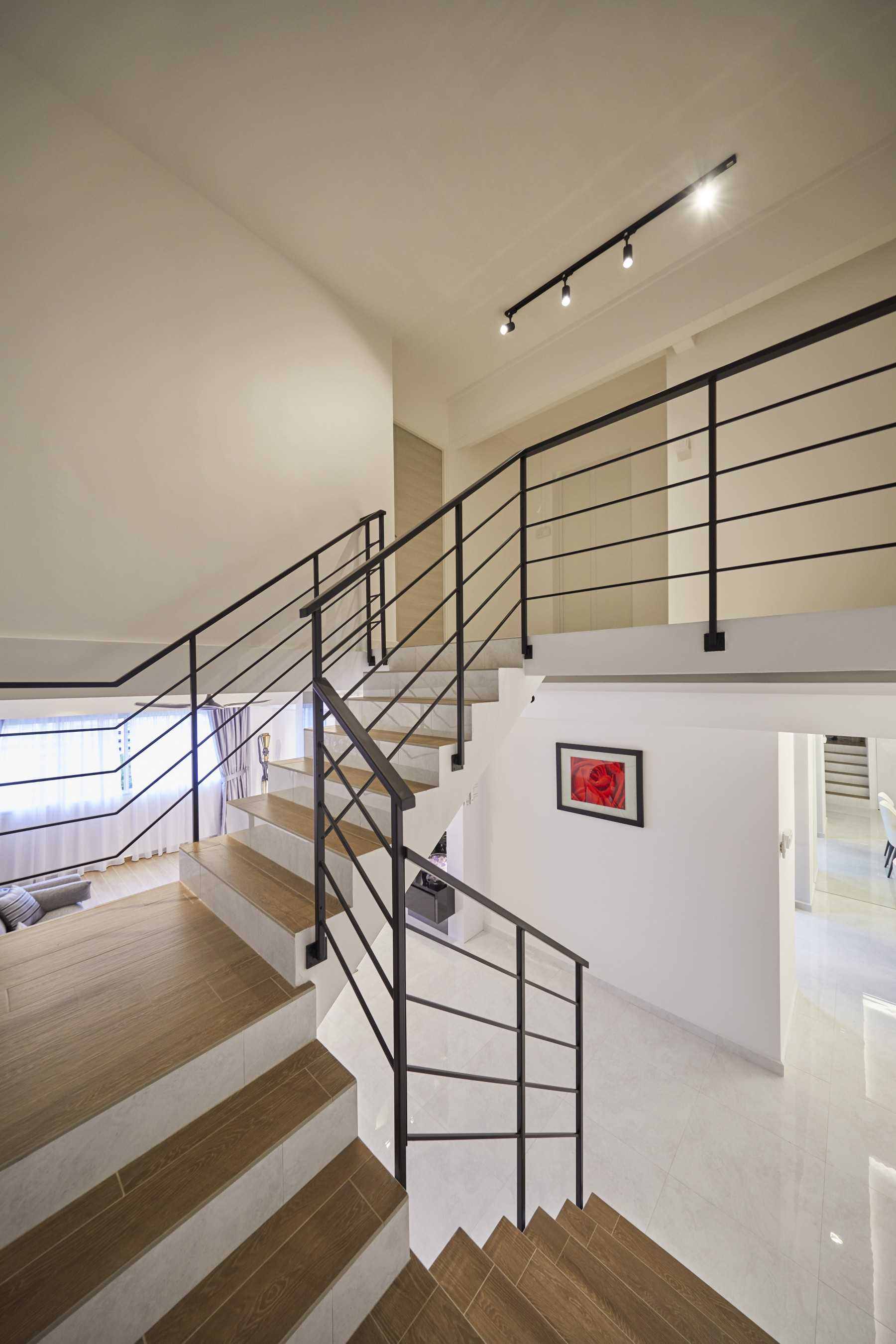 Modern Bedroom with Staircase and Paintings