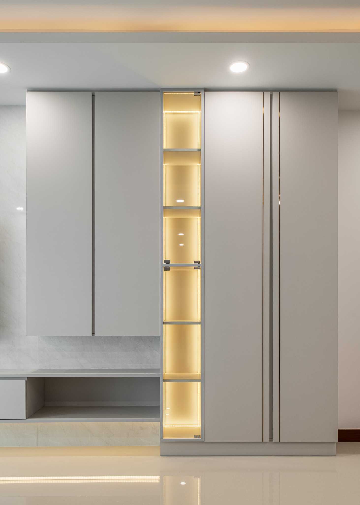 Contemporary Living Room with Bookshelf and Homogeneous Tiles