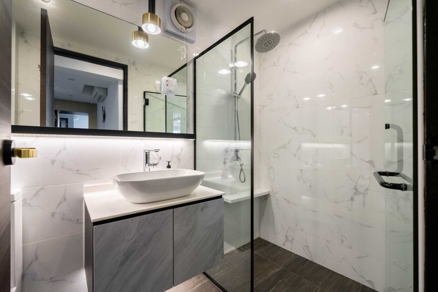 Contemporary Bathroom with Herringbone Tiling and Wood Flooring