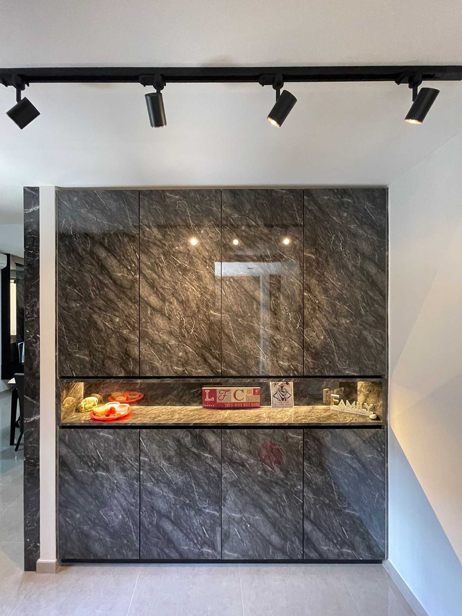 Modern Entryway with Paintings and Storage Cabinets